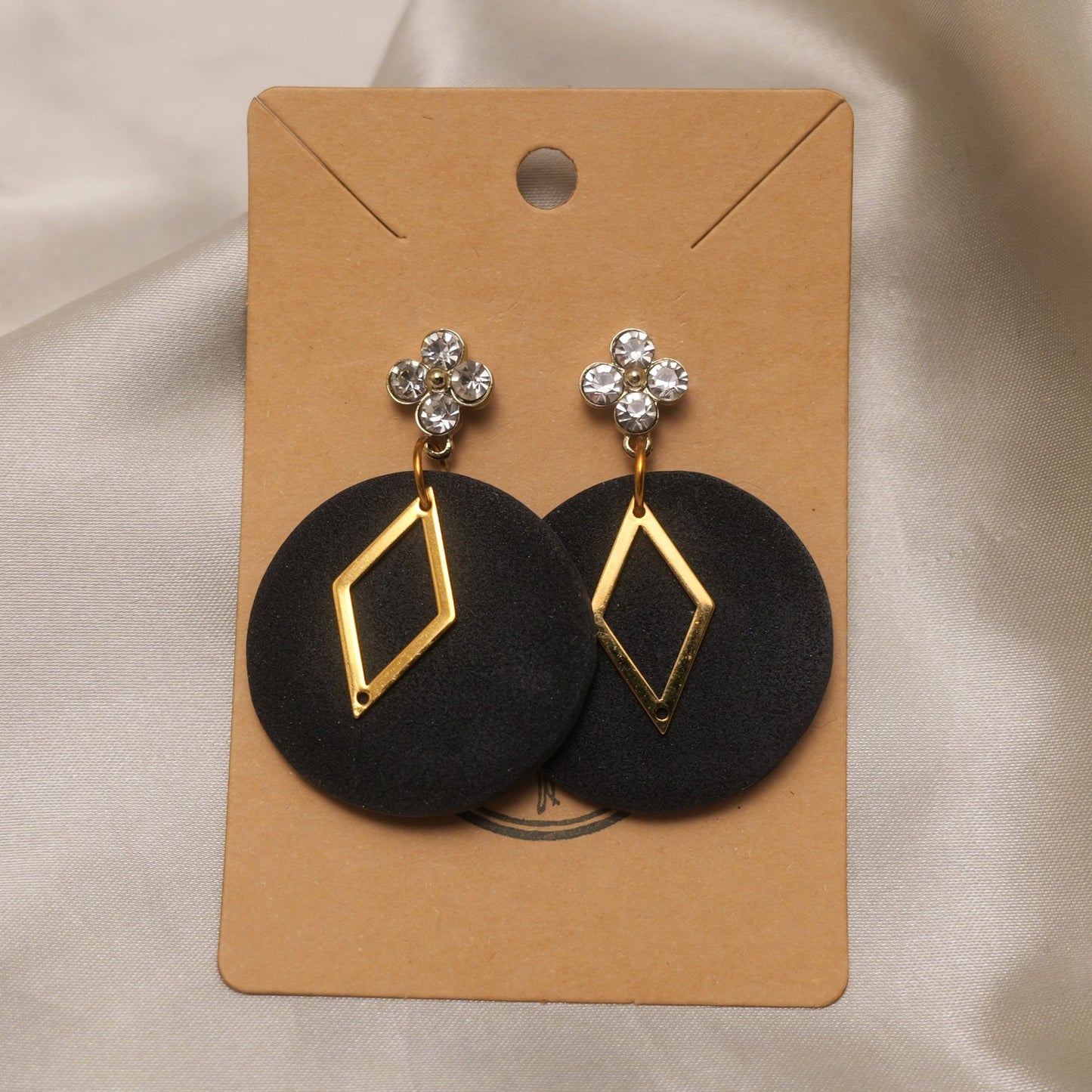 Black Shimmery Dangle Earrings with Flower Rhinestones and Gold Detail