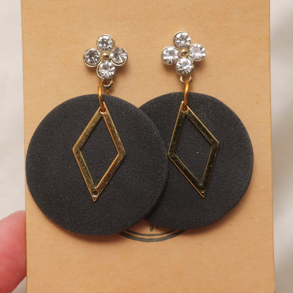 Black Shimmery Dangle Earrings with Flower Rhinestones and Gold Detail