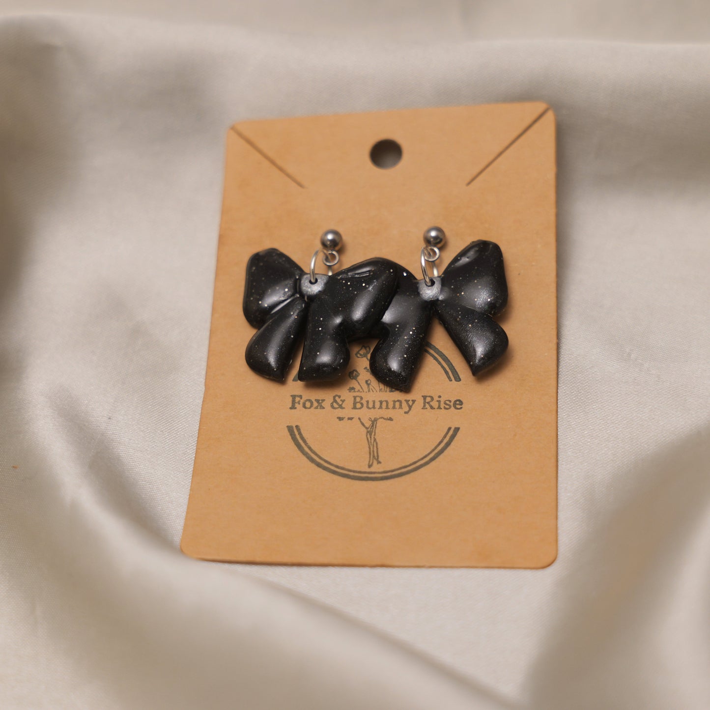 Glossy Glittery Black Bow Dangle Earrings