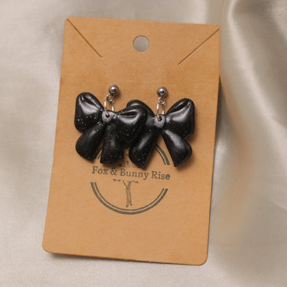 Glossy Glittery Black Bow Dangle Earrings